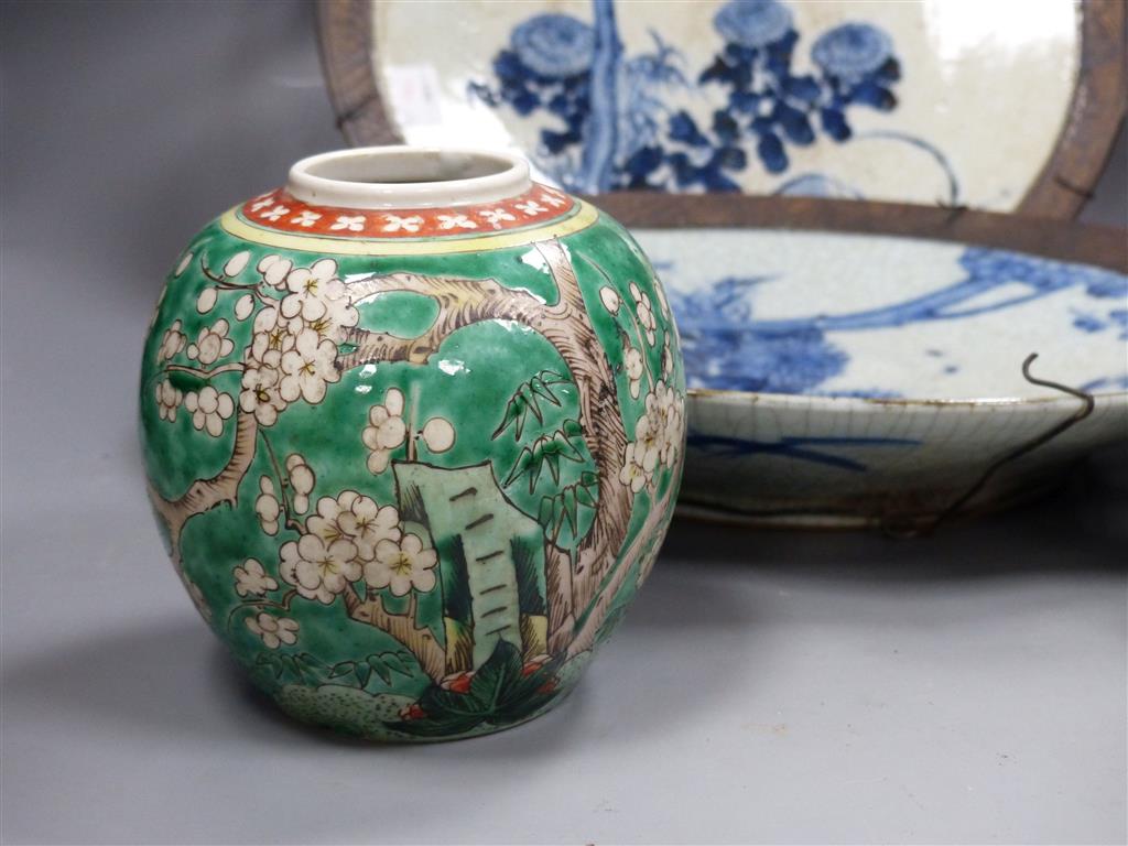 A pair of Chinese crackleglaze dishes and a pair of polychrome jars, late 19th/early 20th century
